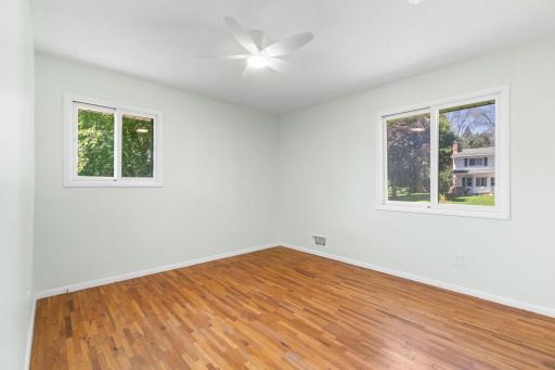 Spacious Primary bedroom with plenty of natural light.
