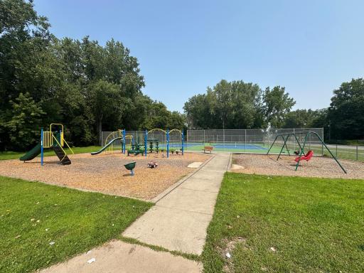 Bass Creek Park features a playground, swings, and tennis courts â a great spot for families and outdoor fun.