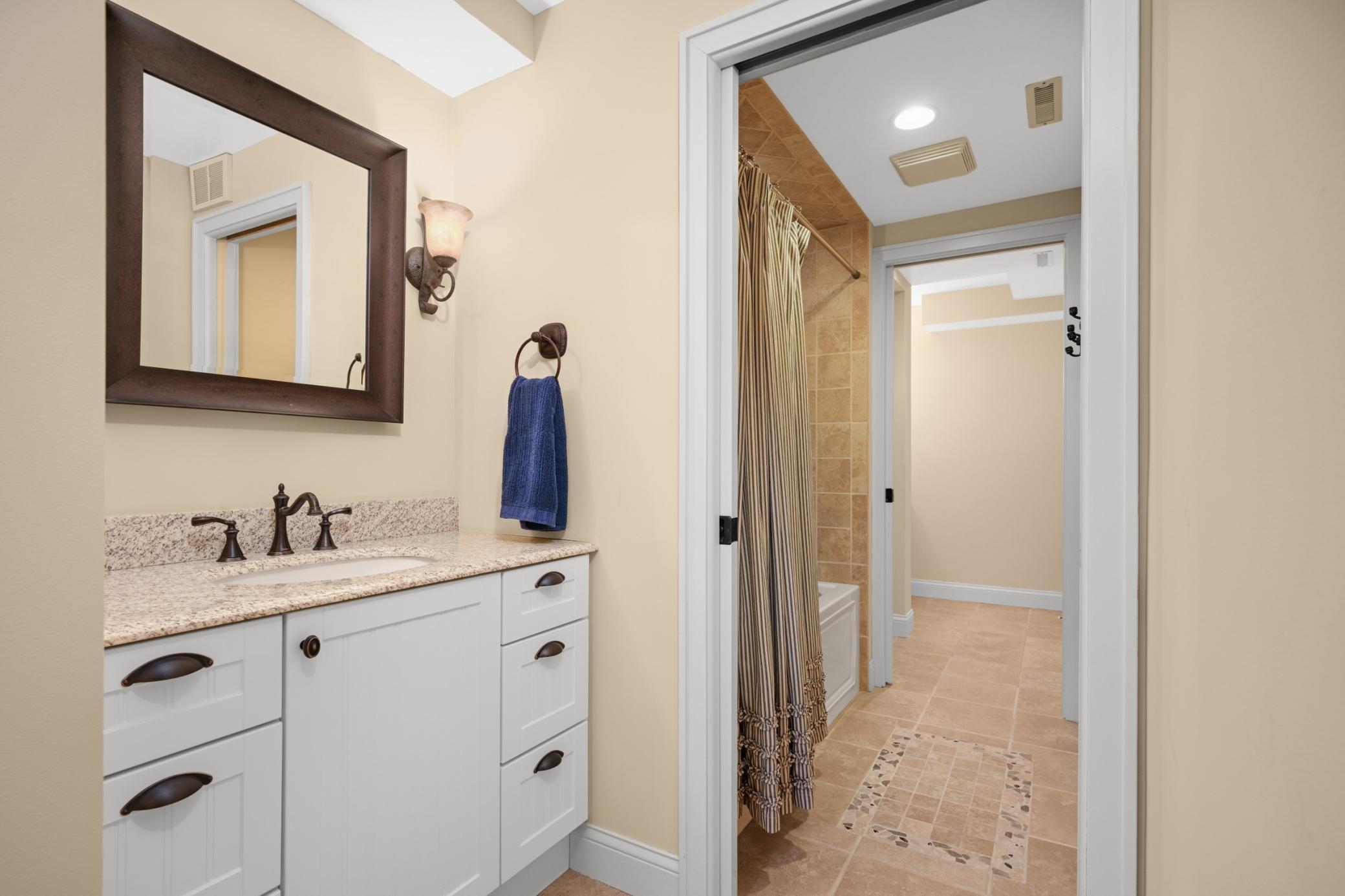 A Jack and Jill bath with a half and full bathroom.