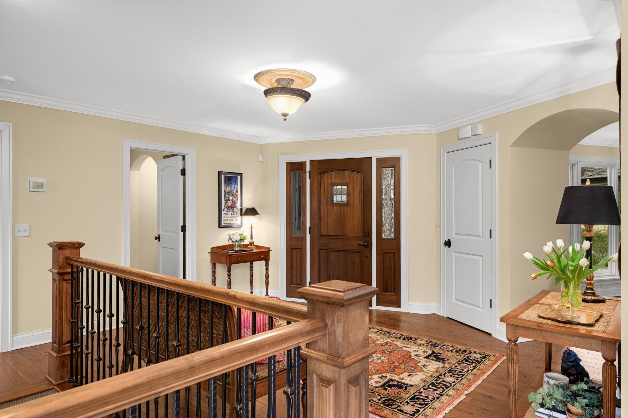 The home features a gracious welcoming foyer with open staircase