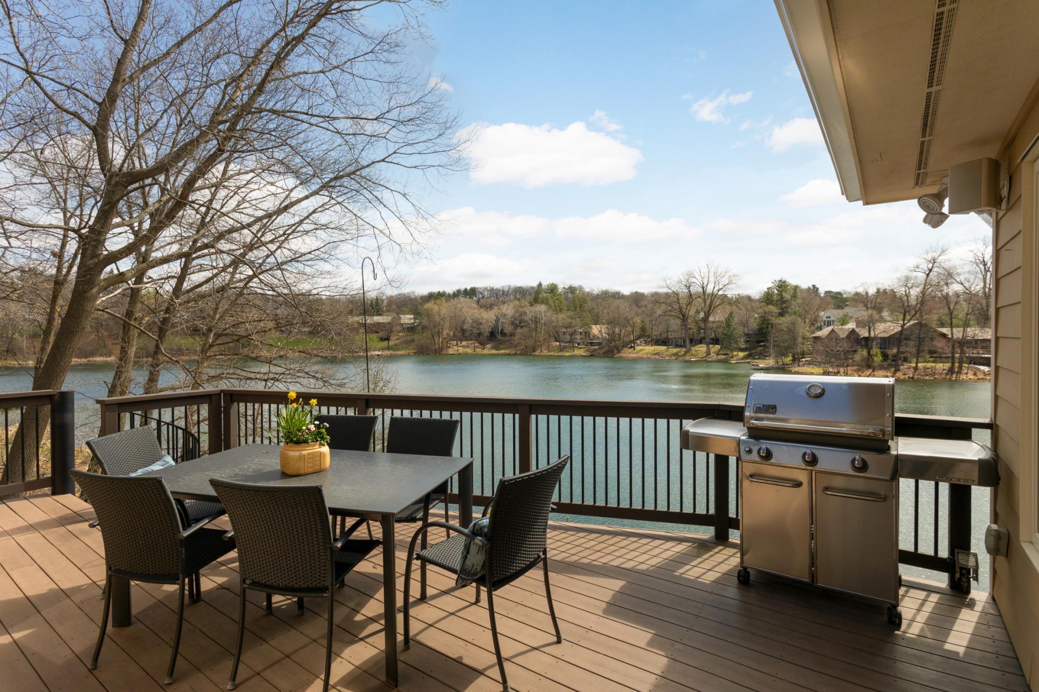 Offering refined one-level living with breathtaking, panoramic views of Indianhead Lake from nearly every room.