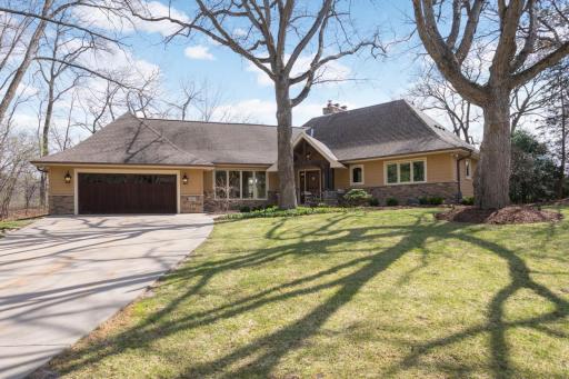 Spectacularly reimagined by Knight Construction, this exceptional 4+ bedroom walkout rambler on a .73-acre site in Edinaâs Indian Hills neighborhood