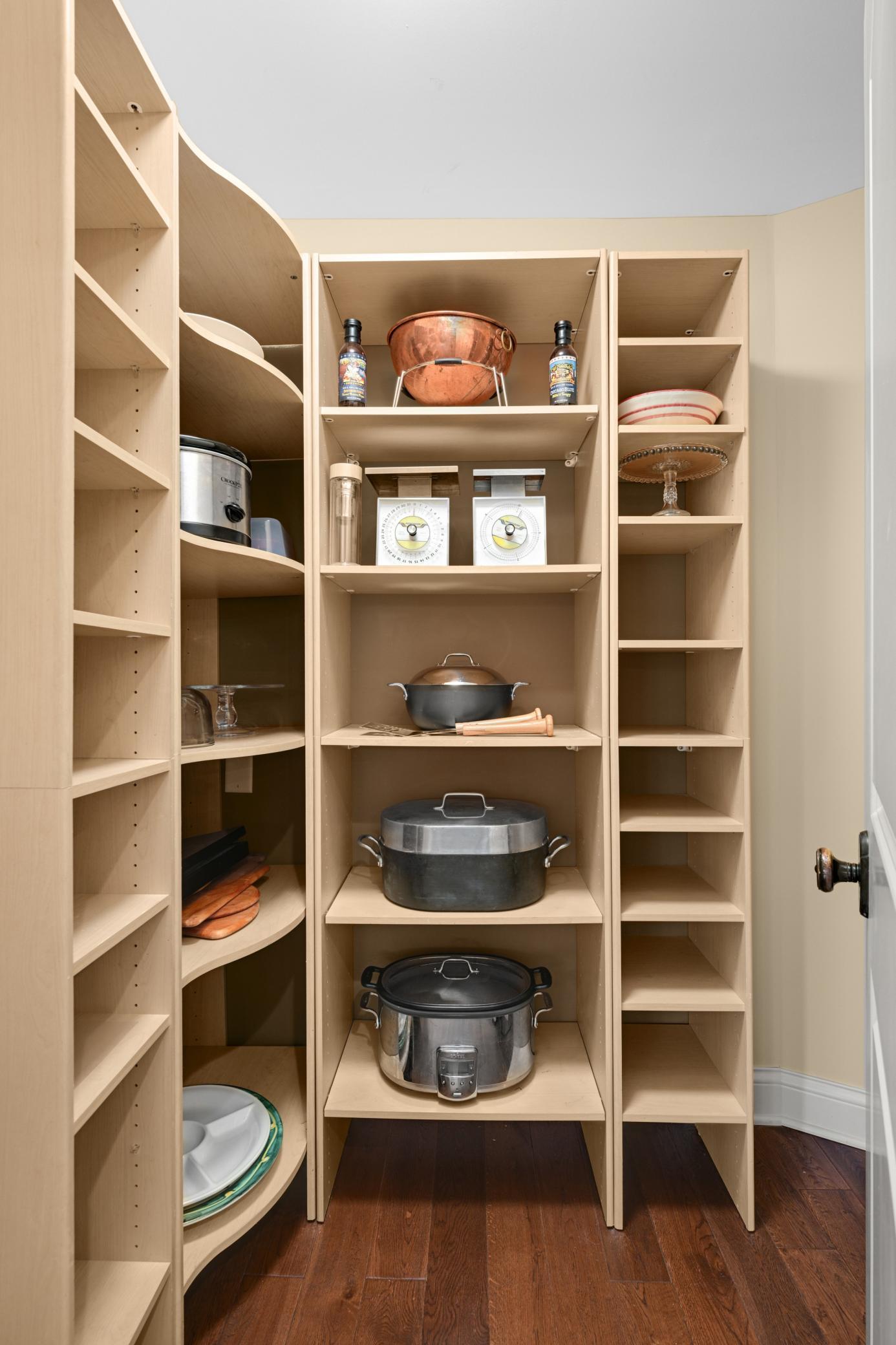 A walk-in pantry in the kitchen