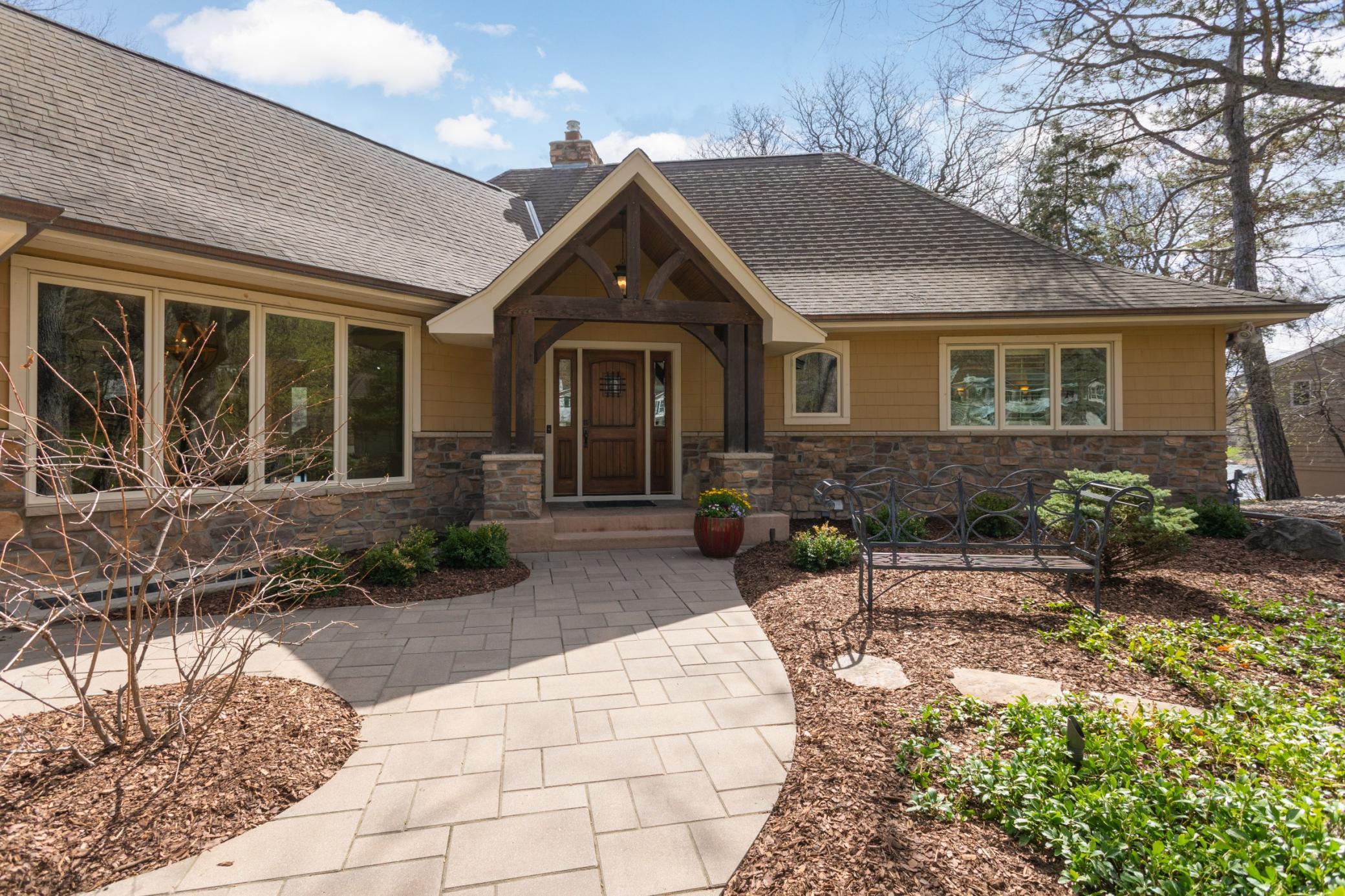 An added portico over the front door and beautiful front door