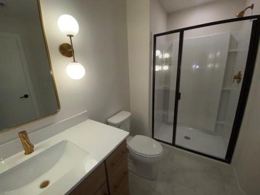 Finished lower level includes another bedroom with walk in closet, Plus Lower level bathroom, Wet Bar, Family room, and Game Room