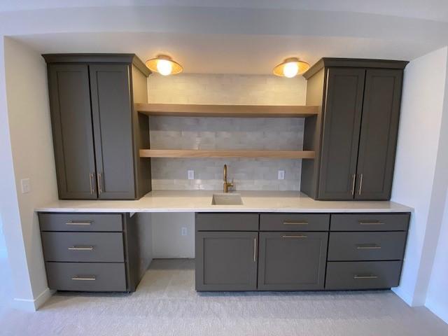 Finished lower level features beautiful custom wet bar, beverage fridge to come.