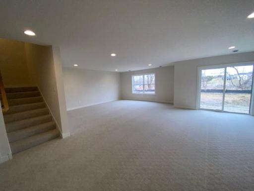 Spacious finished lower level with large windows and walkout to great yard!