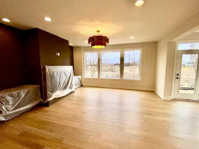 Large Gathering room with beautiful views, Fireplace and custom built-in cabinetry