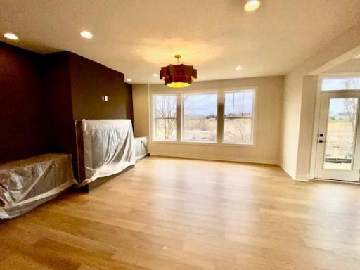 Large Gathering room with beautiful views, Fireplace and custom built-in cabinetry