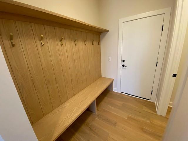 Lovely mudroom with built-in Bench, walk in closet plus 3/4 bathroom with shower near by along with back of home main-floor bedroom/den or resource room.