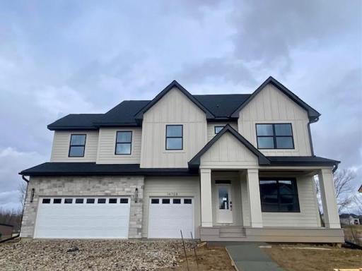 Our newest Robert Thomas Homes model in beautiful Riverwalk in Dayton is almost complete! A sneak peek.... large front porch, spacious garage with 4' bump, walkout lot! 5 or 6 bedroom home with finished lower level and 2nd floor Bonus Room, too!
