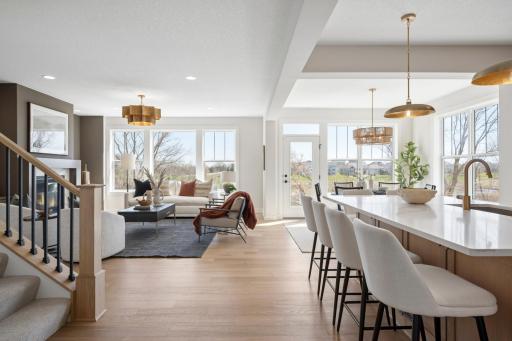 Beautiful craftsmanship and design details throughout! Including Arches, accent walls, Oak hardwood floors, Oak Custom Cabinetry, And stunning Oak kitchen hood.