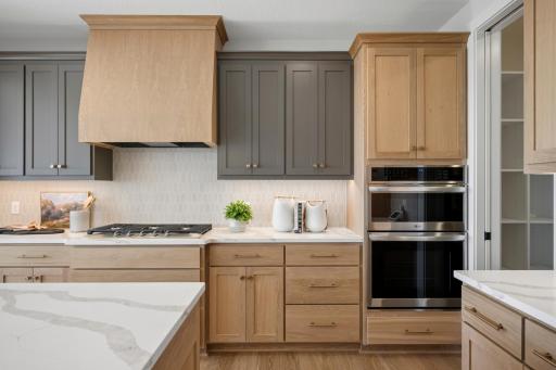 Gourmet Kitchen and gas cooktop! You'll love the Large walk-in pantry for your Costco or Sam's Club shopping, and includes frosted glass pantry pocket door!