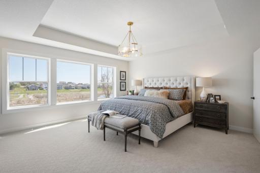 Double doors to Luxurious Primary bedroom!