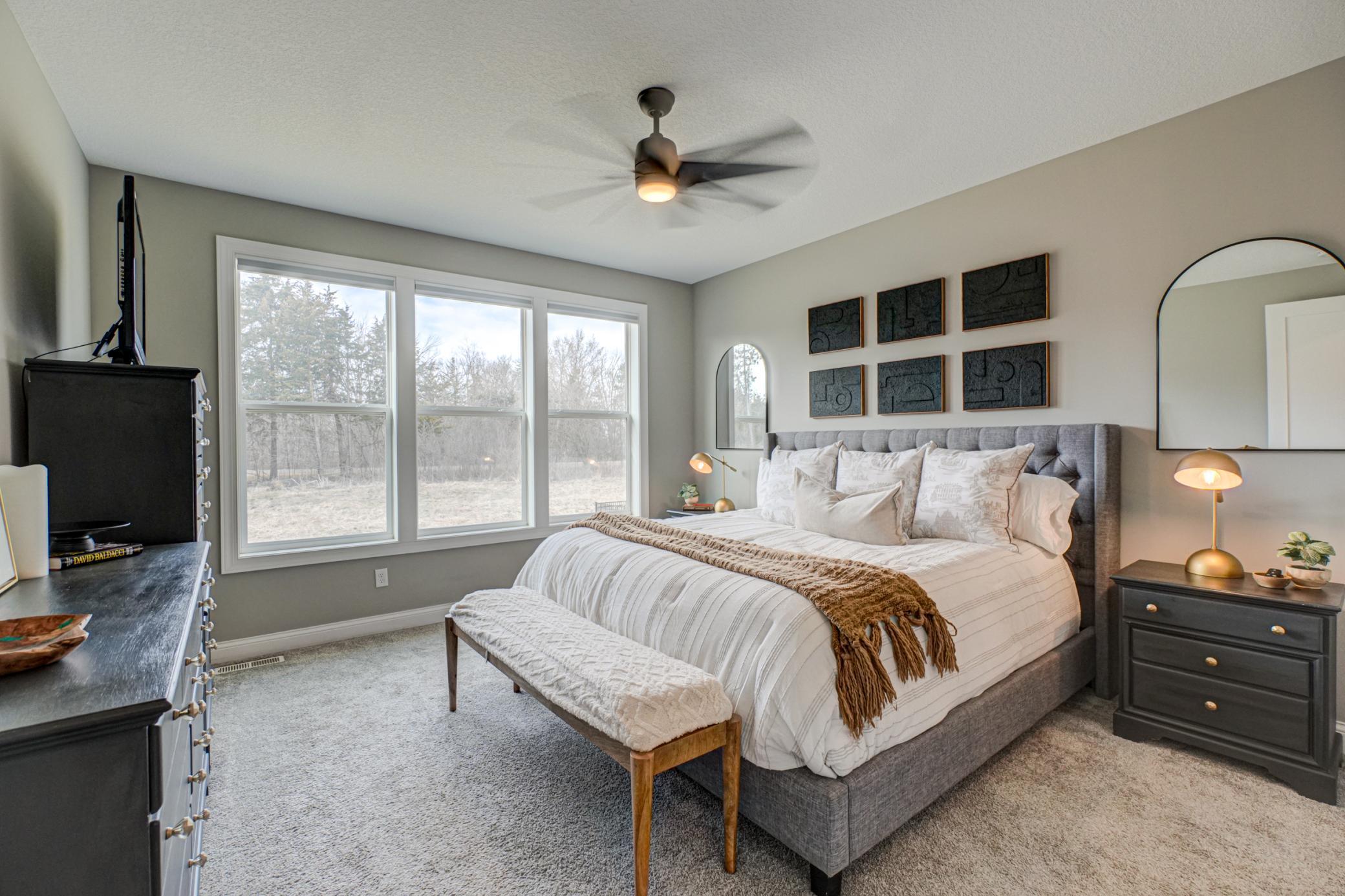 Spacious bedrooms offer comfort for all including a private owner’s suite featuring beautiful backyard views, a spa-like ensuite with double vanities, walk-in shower, and tub.