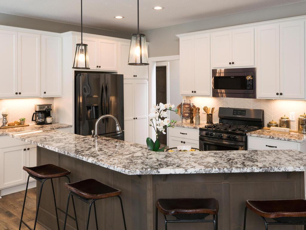 Photos are of a previous model home, some features may vary.