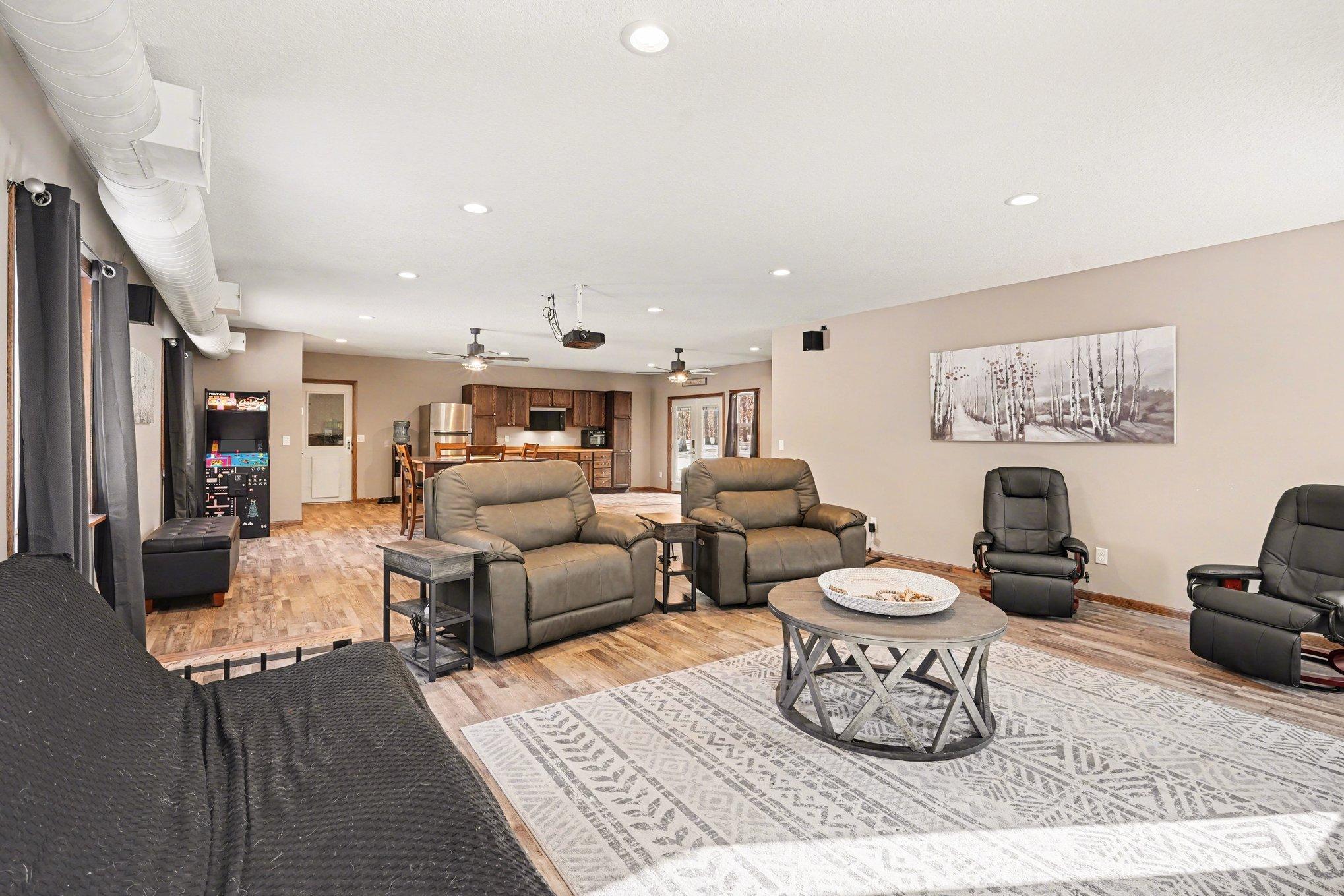 This 2023-rebuilt shop & entertainment center is a show-stopper! It features LVT floors, recessed lighting, & knockdown ceilings. Whether you need a massive shop or the ultimate game room, this incredible space has it all!