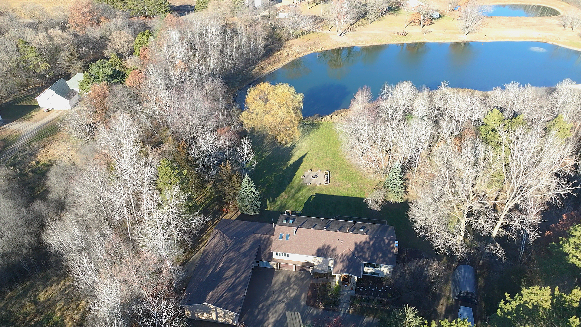 Gorgeous wooded lot on a large pond.