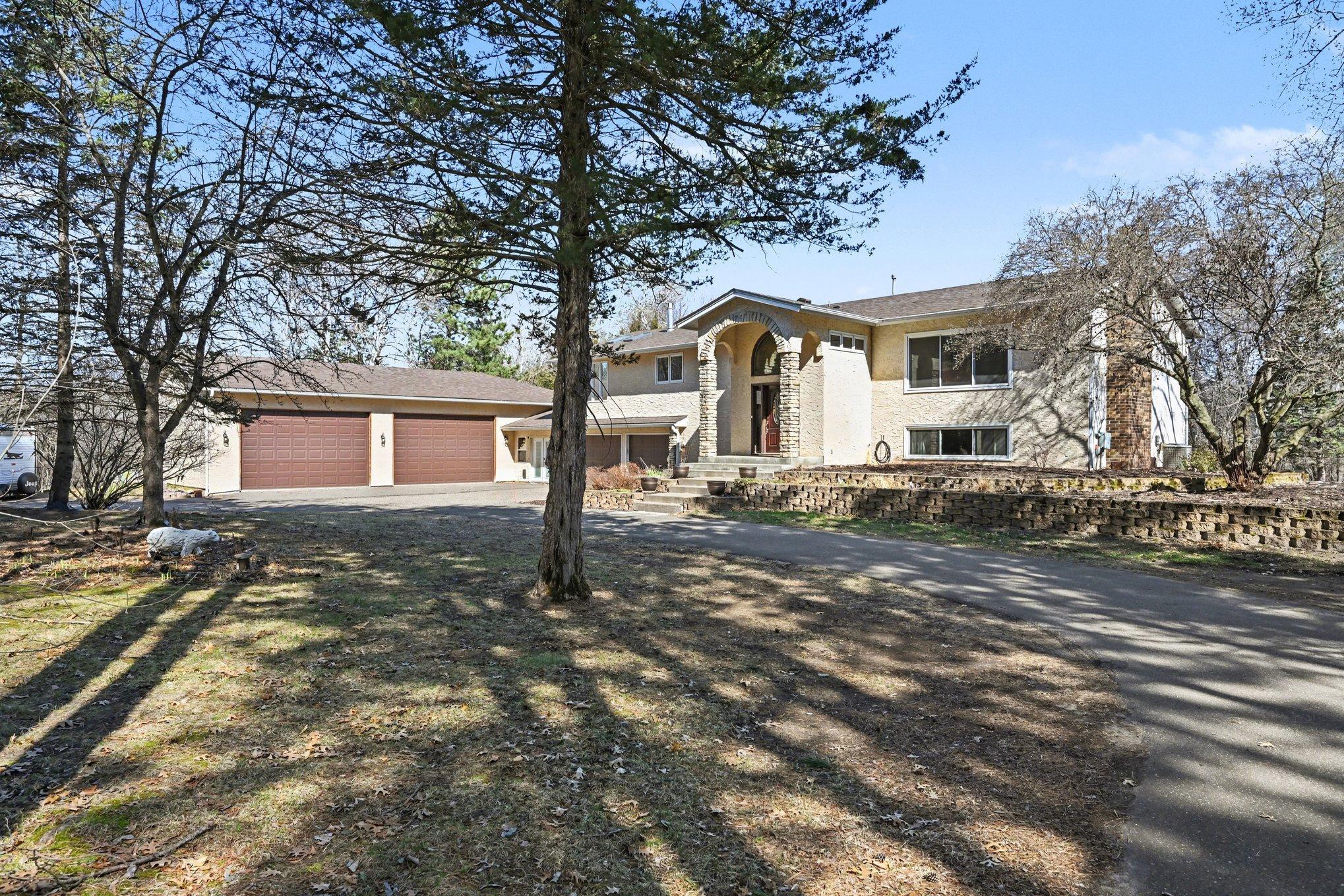 Your private retreat awaits! Nestled on 3.8 wooded acres with a pond, this 4BR/4BA gem features a 6+ car garage & massive shop/entertainment room. Enjoy total privacy with easy freeway access. Truly an entertainer’s DREAM!