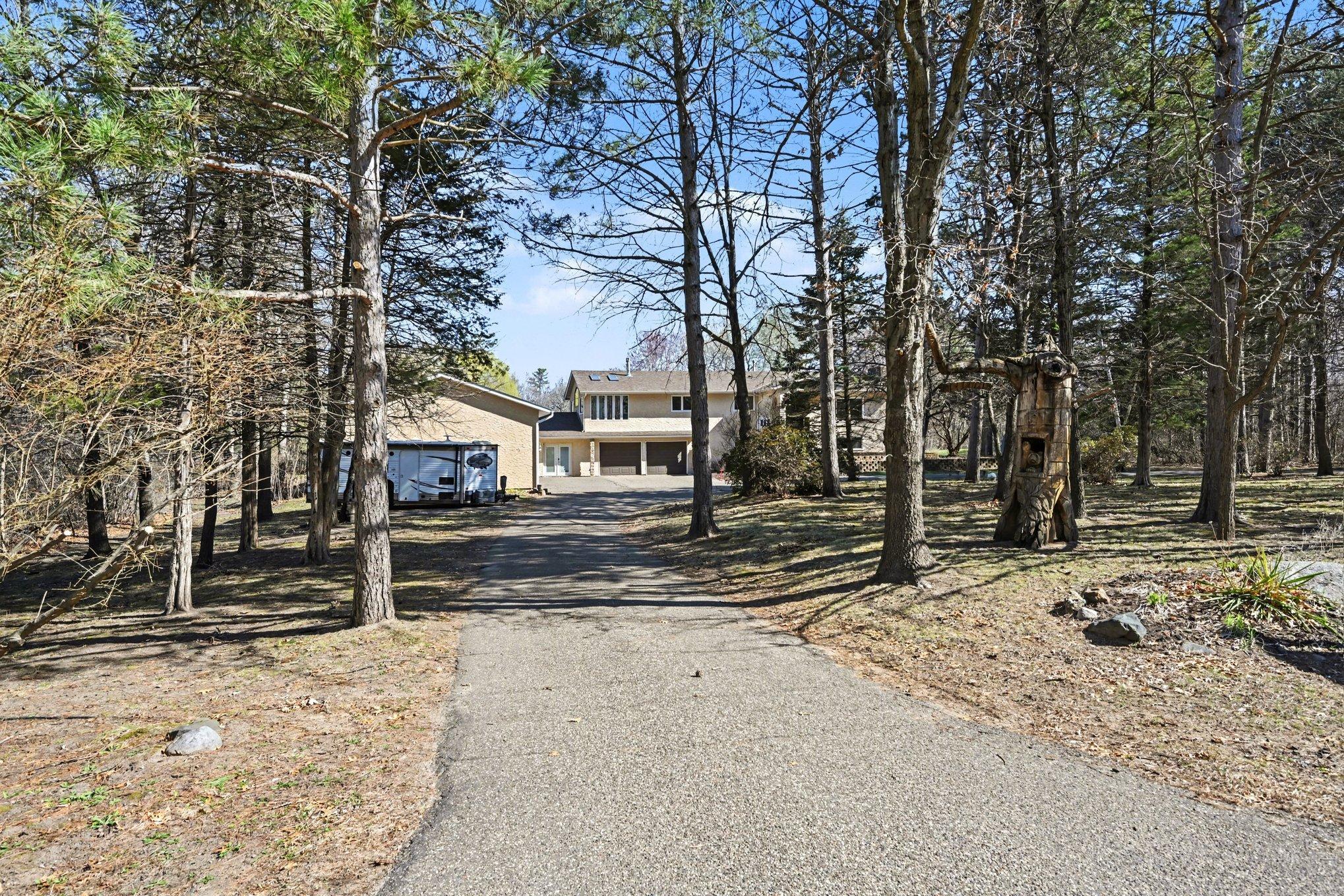 The convenient horseshoe driveway makes vehicle management effortless and provides plenty of parking for all your guests.