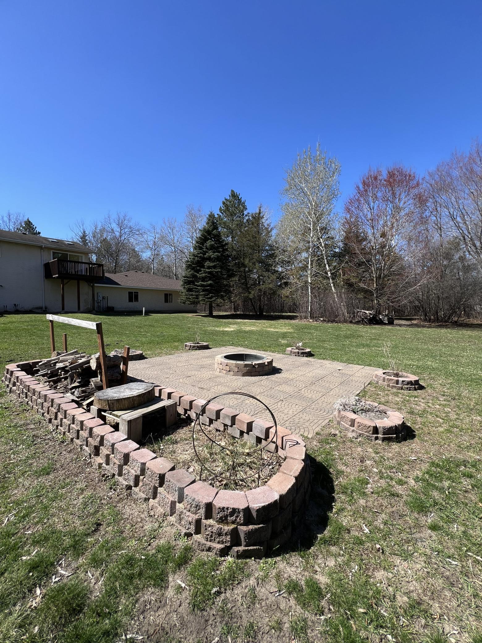 You’ll spend many nights gathered with family and friends around the built-in firepit, surrounded by the beauty of nature. It’s the perfect spot to unwind and make memories under the stars.