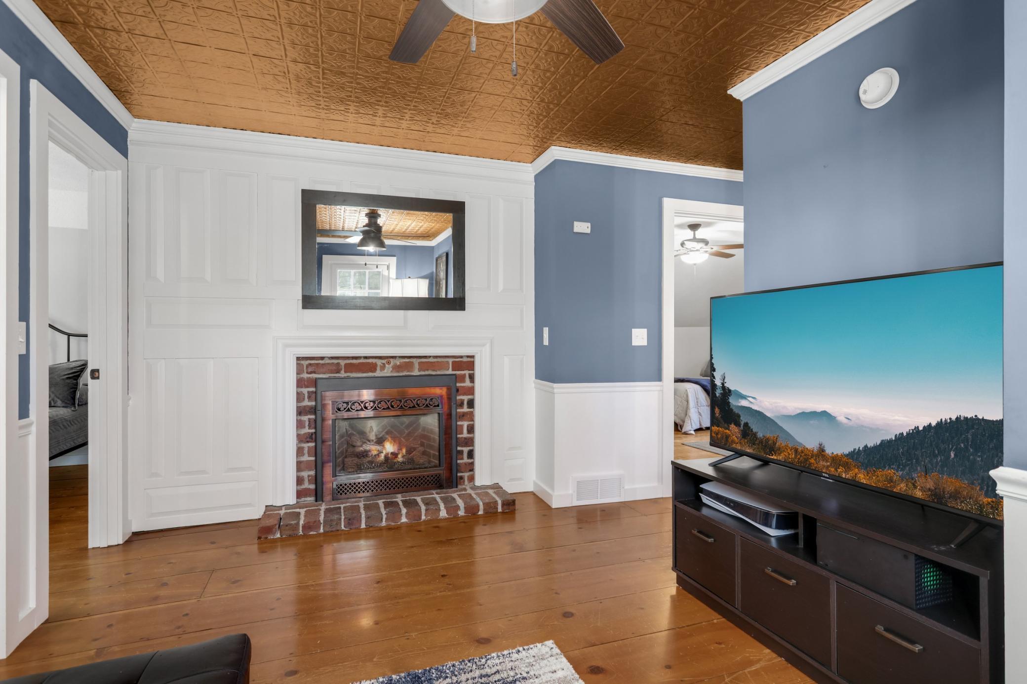 Upper Level Loft w/ 2nd Fireplace in home