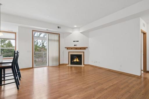 Gas fireplace, private deck, hardwood floors