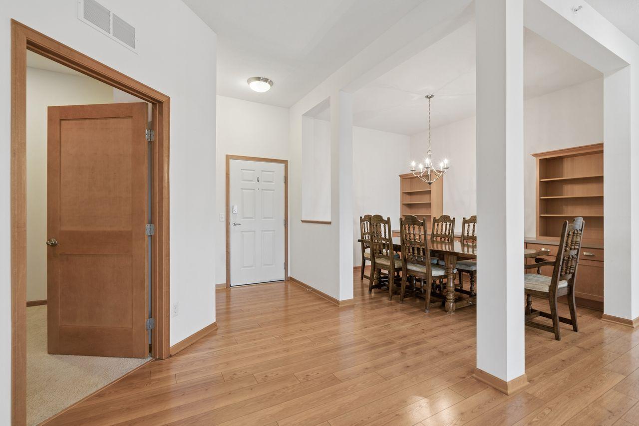 Separate dining + den (door)