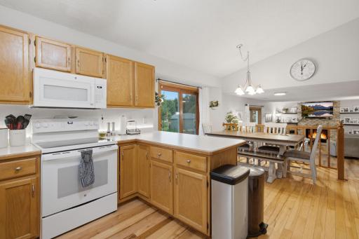 This home allows for there to be free flow of engagement between the kitchen/dining area and the lower-level family room.