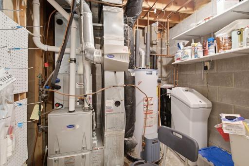 Your utility room is in the lower level. There is some availability for storage too. Water softener is owned.