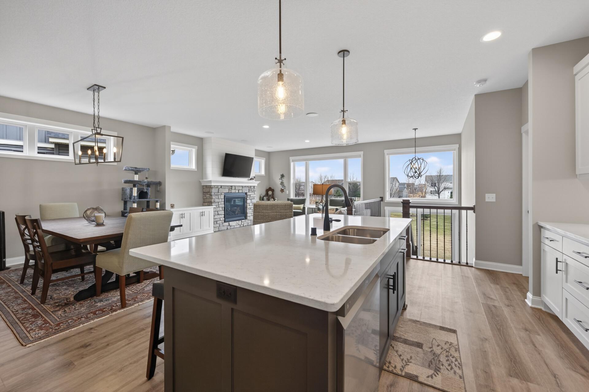 Kitchen offers quartz countertops, stainless steel appliances and custom built cabinetry!