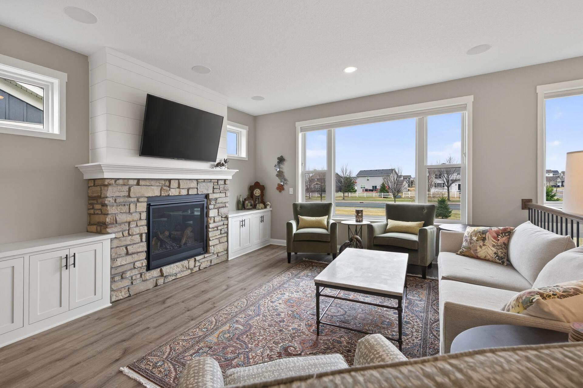 Living room with LVP flooring carried throughout most of the main level!