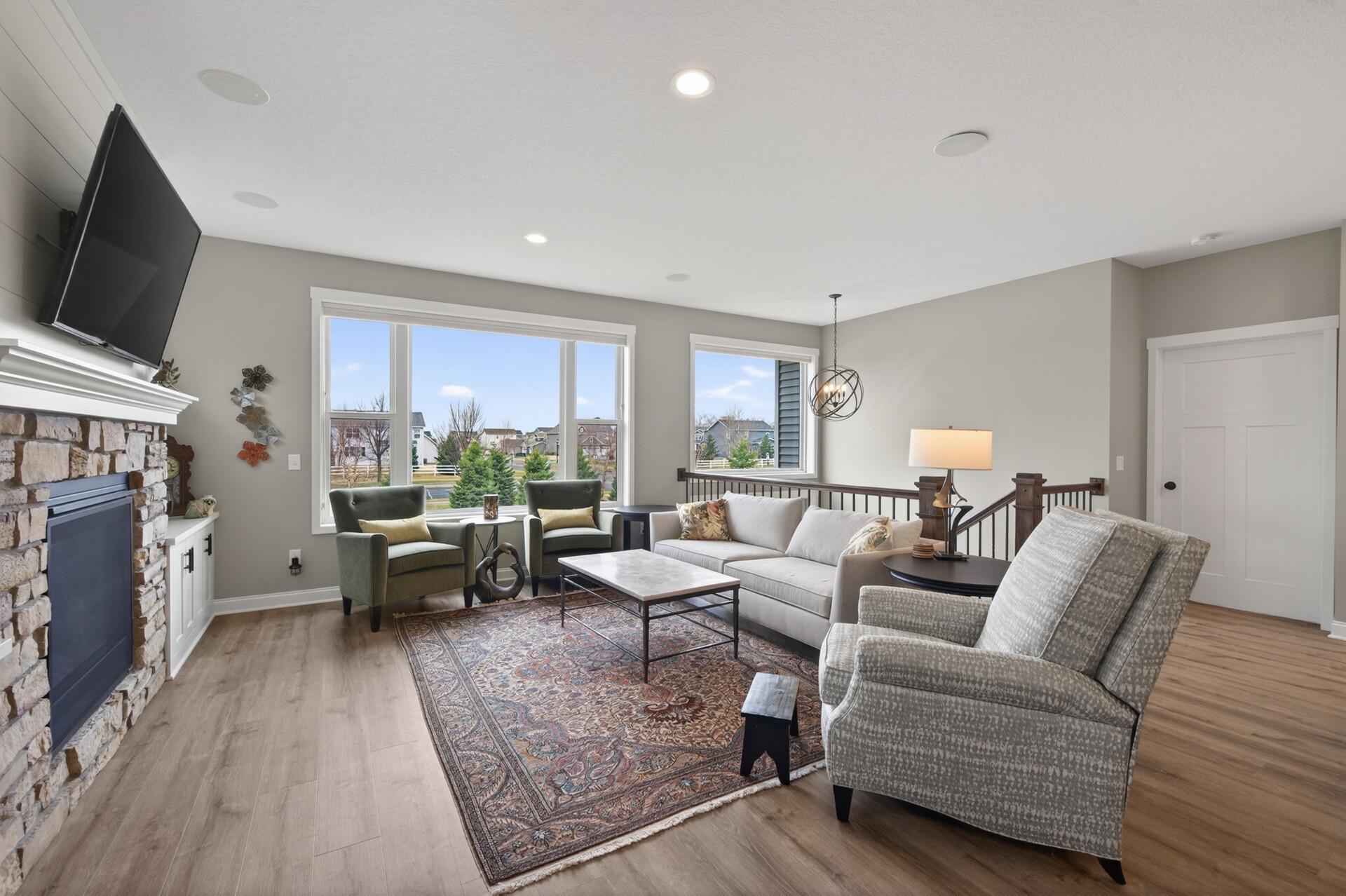 Living room with LVP flooring carried throughout most of the main level!