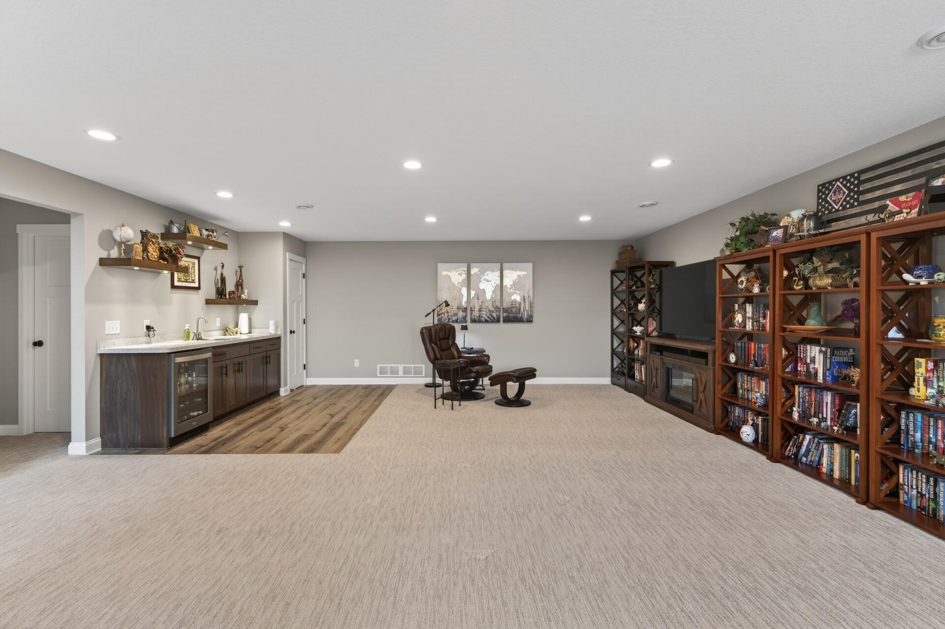 Lower level space also offers a wet bar and small pantry