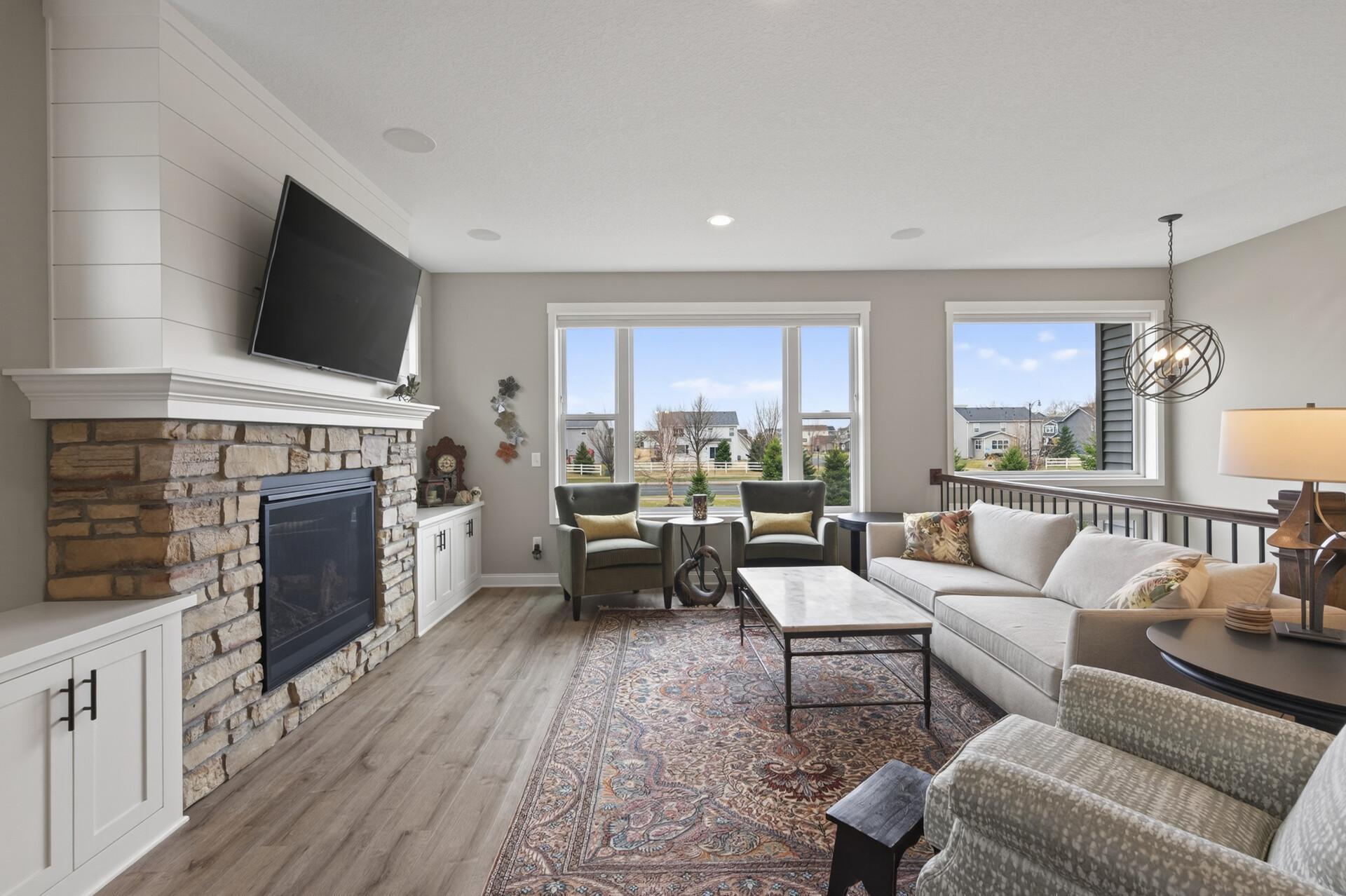 Living room with LVP flooring carried throughout most of the main level!
