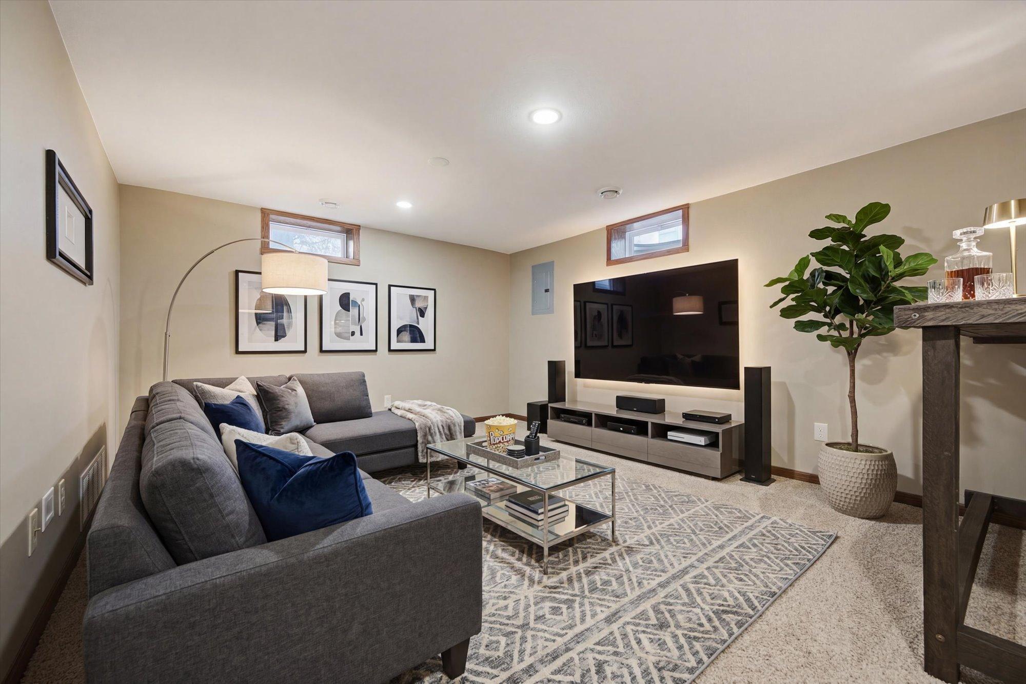 Virtually staged to showcase its potential as a comfortable entertainment space.