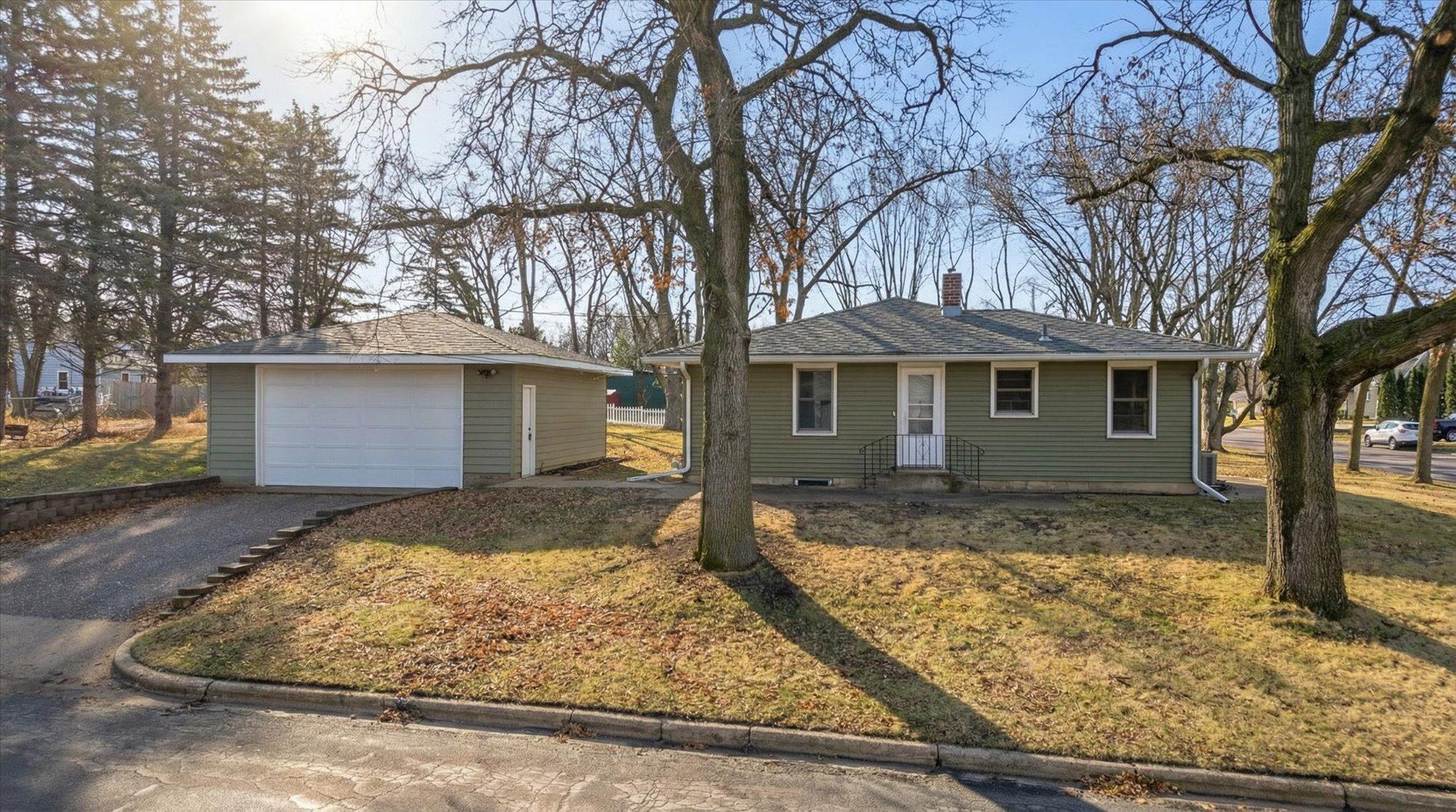 Enjoy the benefits of a large corner lot, mature shade trees, oversized two-car garage, and a newer roof to help put your mind at ease.