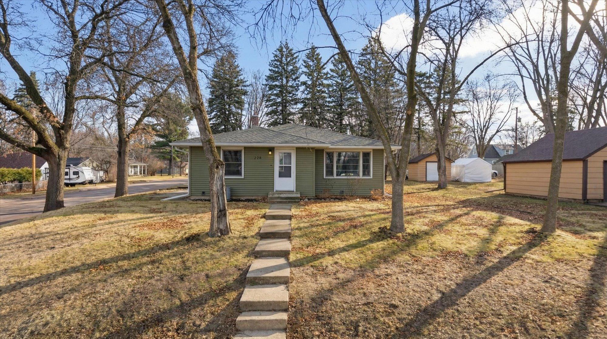Charming walkway with steps leading up to the front door.