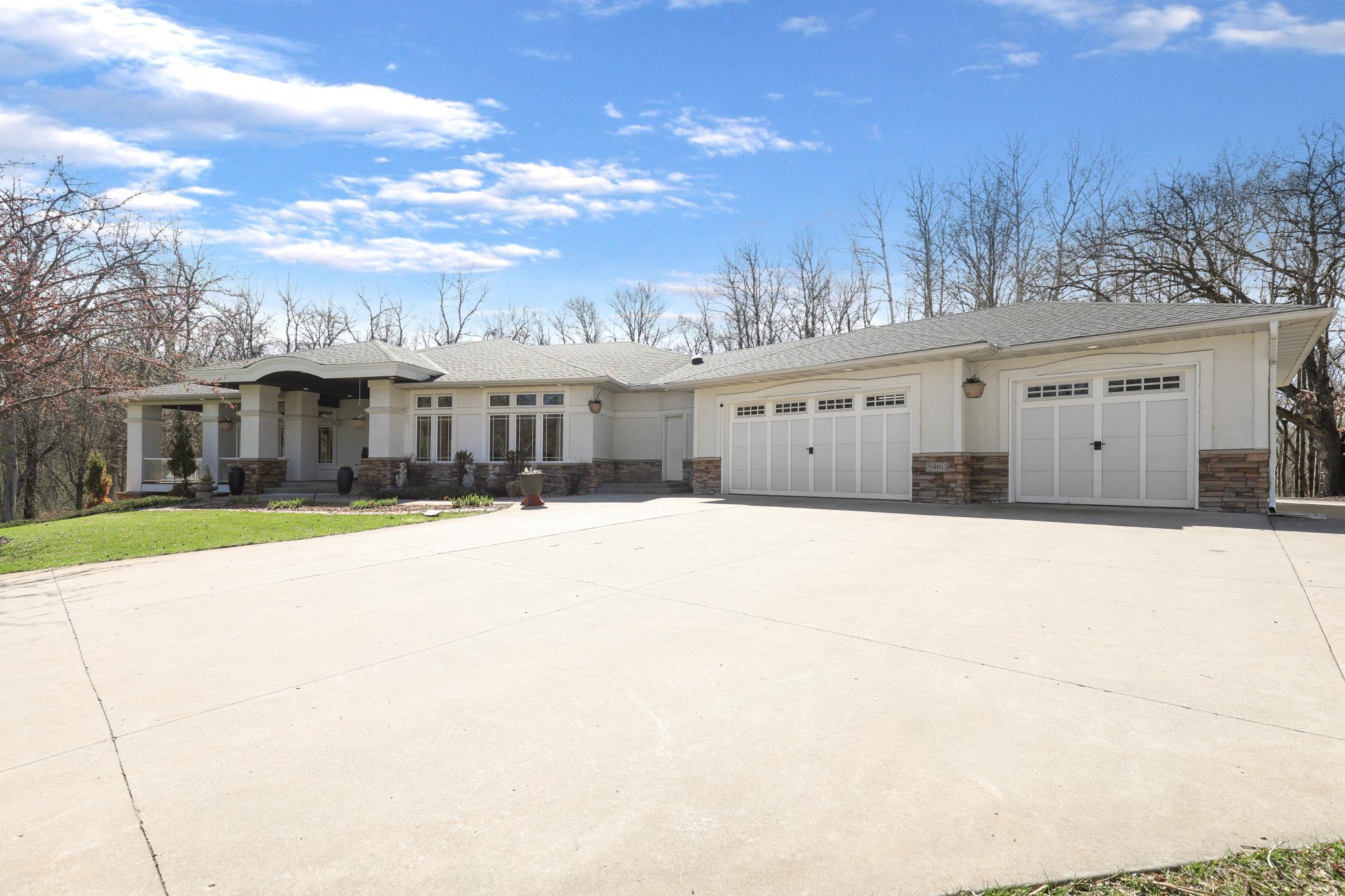 Welcome Home to 9401 Elm Court Prior Lake MN 55372. A striking first impression, timeless design and expansive frontage.