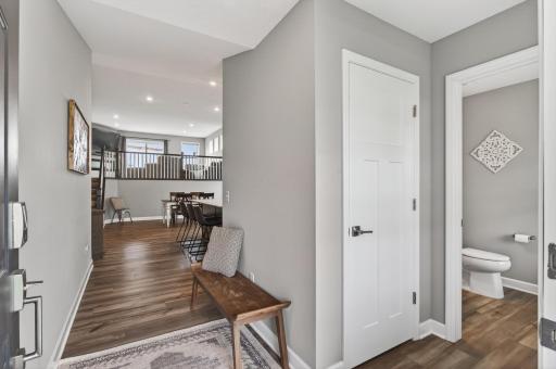 A bright, welcoming entry sets the tone for the thoughtful design found throughout the home.