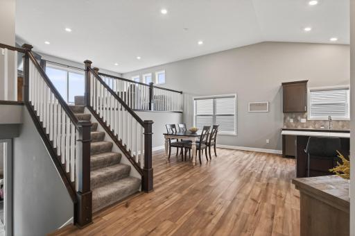 The open-concept layout creates a spacious feel while still offering distinct living spaces.