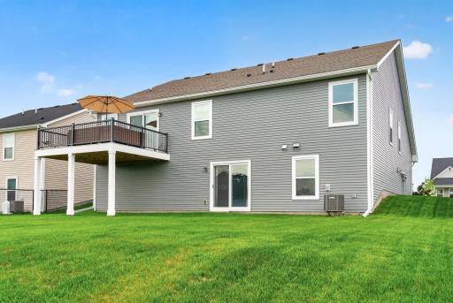 No cramped backyard feeling here. Enjoy open green space, a walkout lot, and room to enjoy the outdoors.