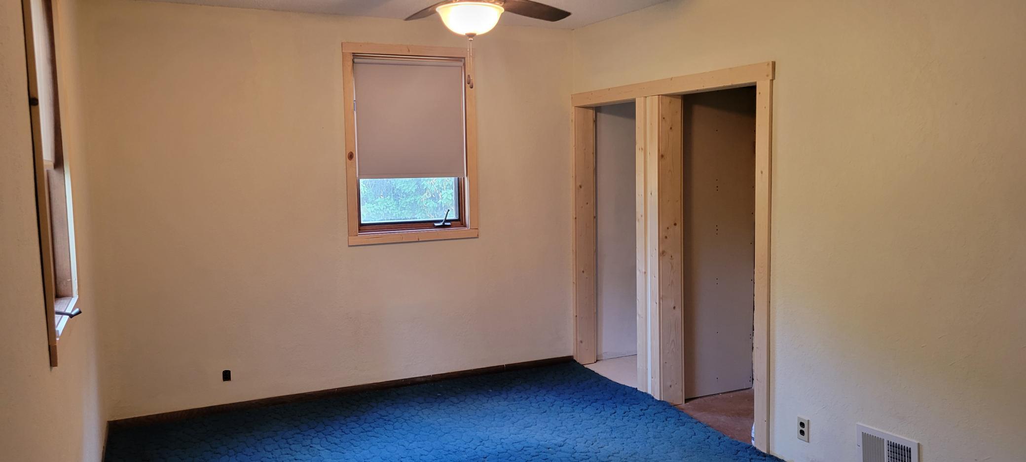 Spacious main floor bedroom w/2 closets