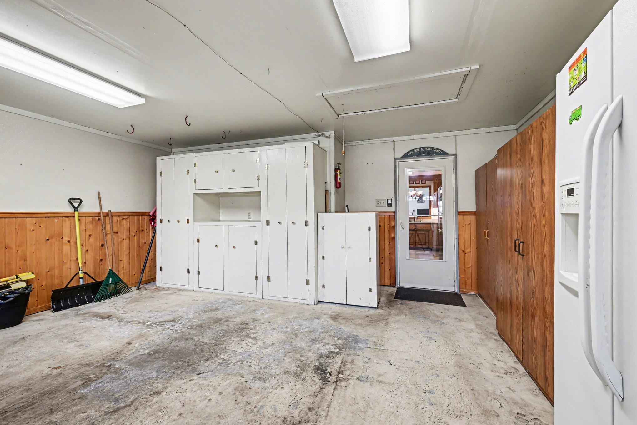 Finished 458 sq ft garage with storage.