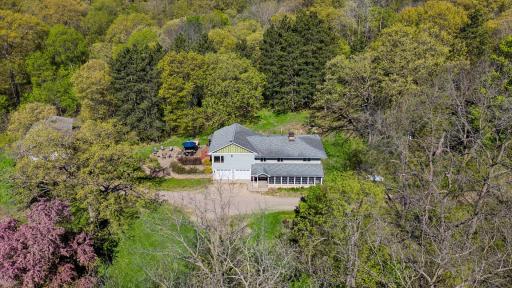 Surrounded by mature trees, the property offers privacy, beauty, and a true connection to nature.