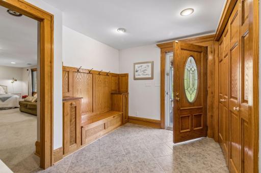 A spacious foyer with room to gather, greet guests, and stay organized with added closet space.
