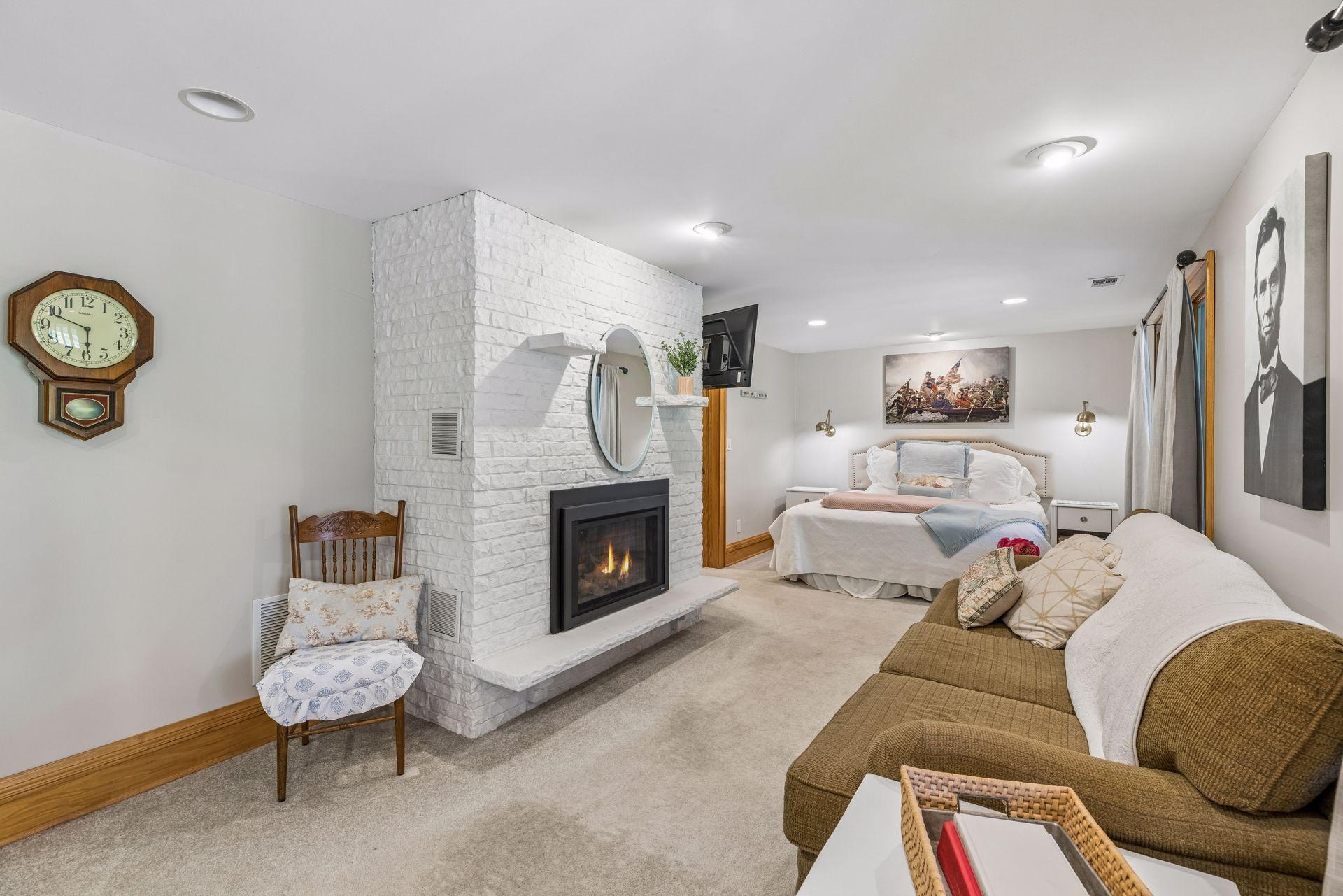 A cozy gas fireplace creates the perfect atmosphere within the primary suite.