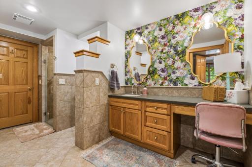 Private Â¾ bath featuring a tiled shower.