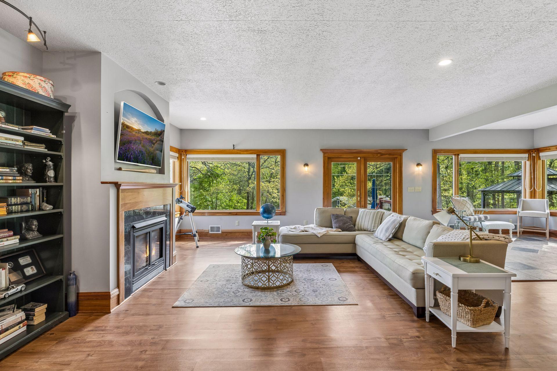 Updated plank flooring adds a fresh, modern feel to the living space.