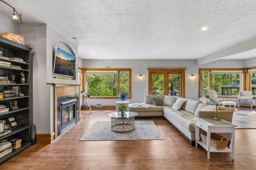 Updated plank flooring adds a fresh, modern feel to the living space.